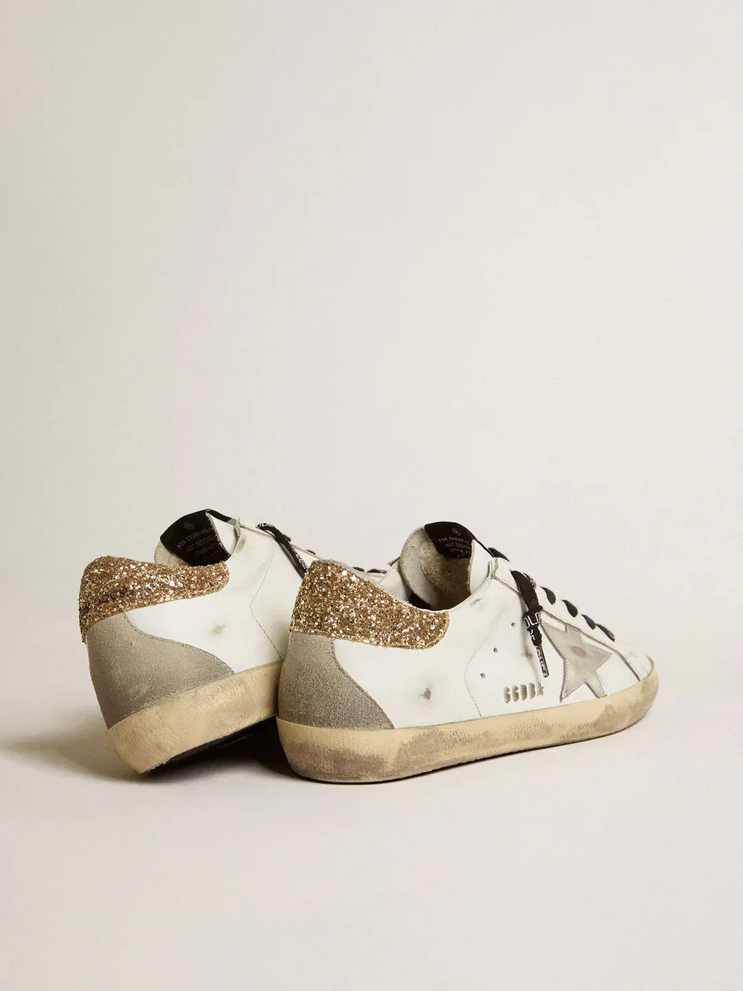 Super-Star en cuir blanc avec contrefort pailleté